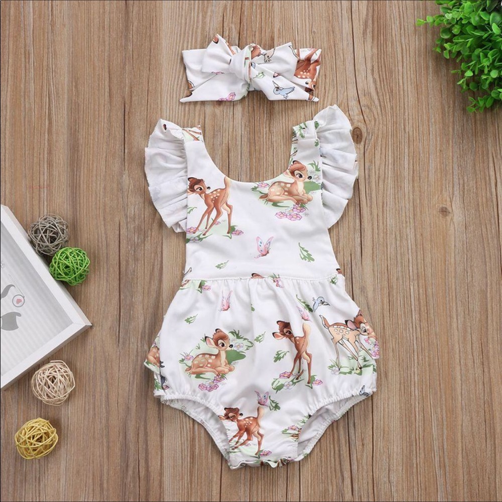 Baby girl romper size 70 which is 3-6 months